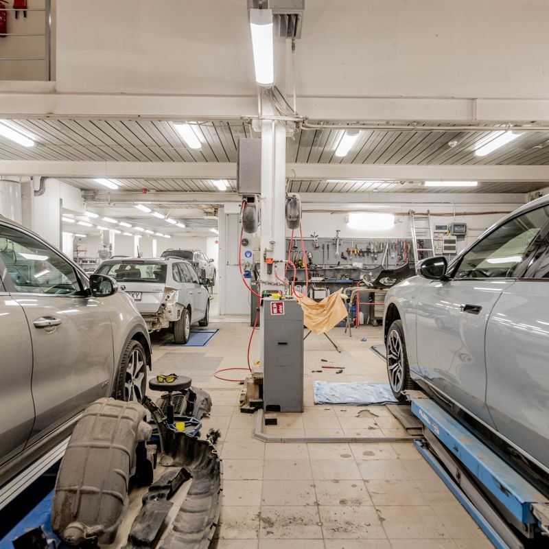 Vehicles being worked on in the workshop